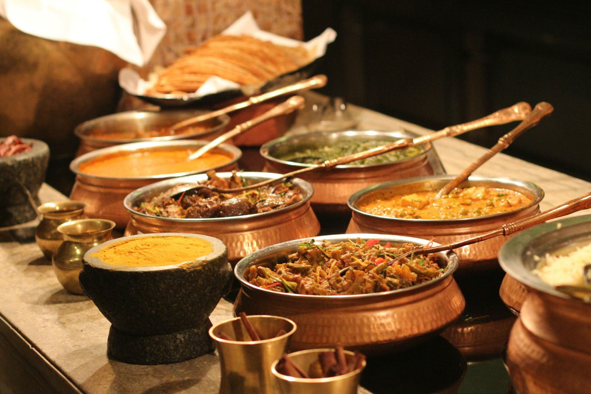 Several Indian food dishes